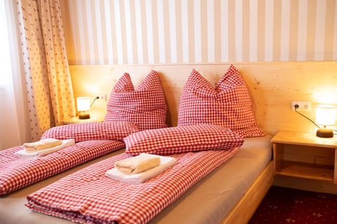 Frette Italian sheets, premium bedding, down comforters