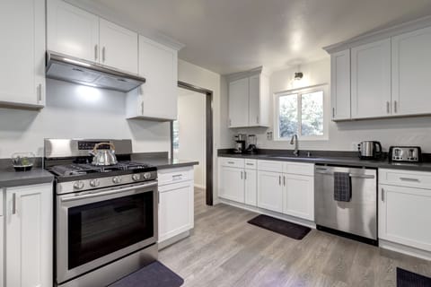 Remodeled kitchen with coffee maker, electric kettle, toaster, and InstantPot