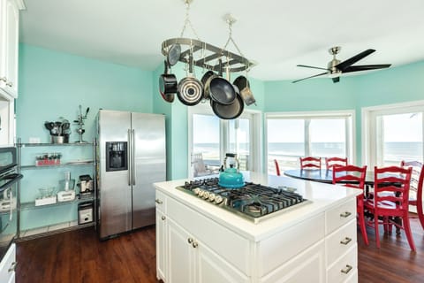Fully equipped kitchen with gas range and stainless steel appliances