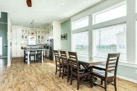 Dine overlooking the Gulf at the large table