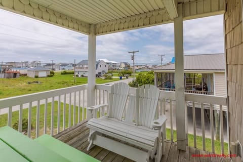 Covered front porch with swing