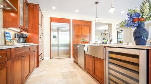 GE Monogram Appliances, including a Wine Fridge, an Induction Stovetop, built-in Oven & Microwave, a huge Pantry and built-in Refrigerator with water and ice dispenser