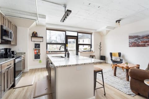 Open living, dining and kitchen space