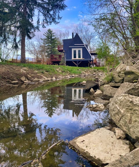 View of the chalet from the brook which meanders through large private lot