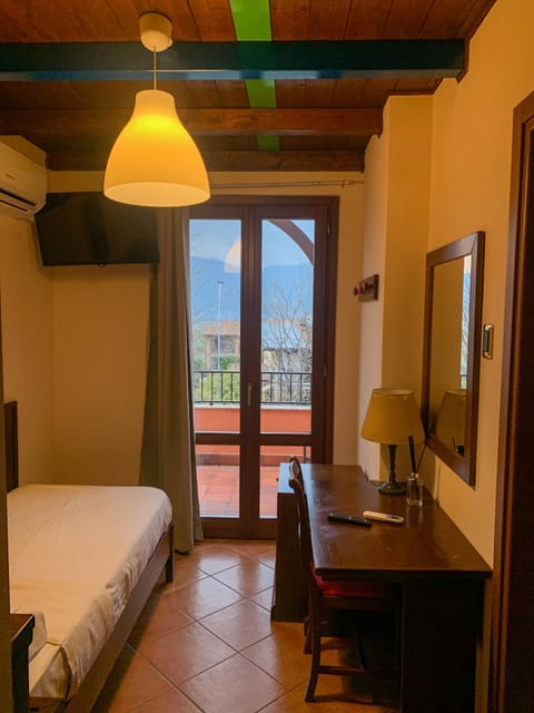 Basic Single Room | Down comforters, memory foam beds, in-room safe, individually decorated