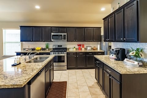 fully furnished kitchen with Keurig coffee maker, tea, sugar, cream...