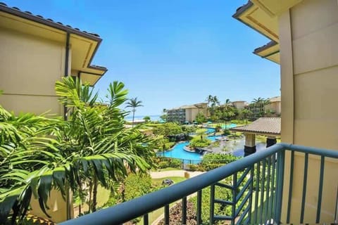 Private lanai retreat overlooking the sparkling resort pool & lazy river