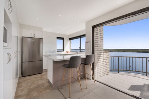 Superior Room, River View | Private kitchen | Full-size fridge, microwave, oven, stovetop