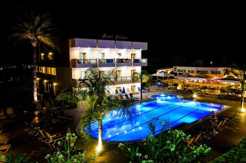 Seasonal outdoor pool, open 8:00 AM to 8:00 PM, pool umbrellas