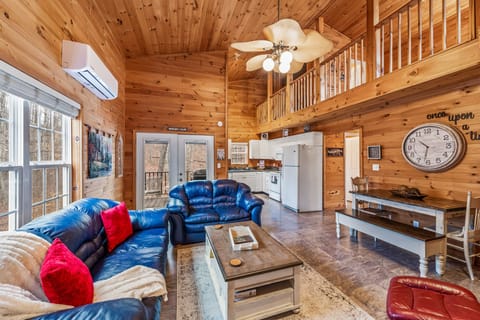 From every window on each of the two stories, views through a canopy of trees