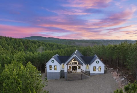 Heart & Hearth offers the ultimate luxury vacation experience -picture perfect views of lush Pines combined with its prime, central location in Hochatown near Beavers Bend State Park, Broken Bow Lake, Mountain Fork River, all the restaurants & attractions!