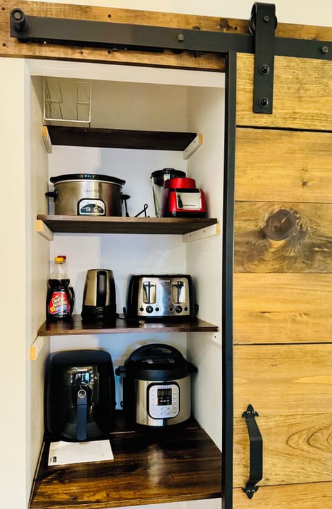 Full kitchen with utensils/cookware, etc. Pantry for your storage.