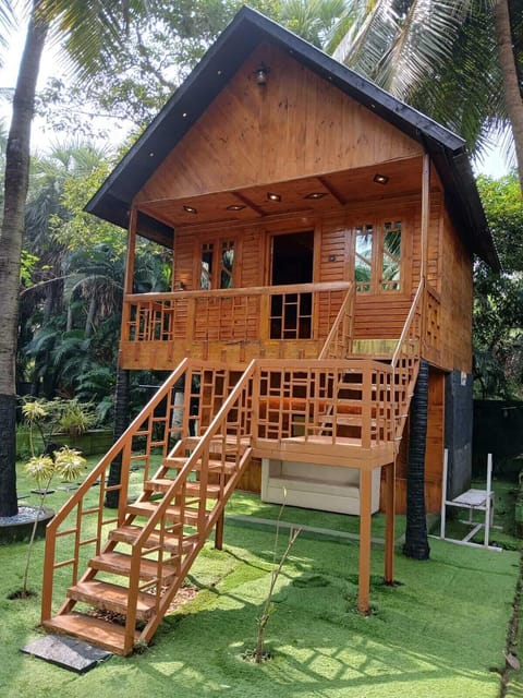 Honeymoon Tree House | Living area | 32-inch LCD TV with cable channels, TV