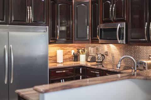 Kitchen with oversized fridge