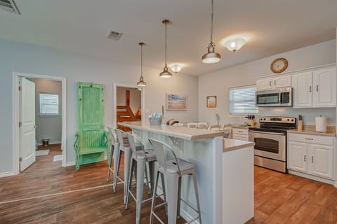 Beautiful, fully stocked kitchen. Highchair and children's dinnerware included.