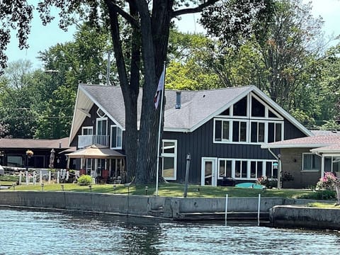Beautiful lakefront home on Paw Paw Lake with direct water access and stunning views.