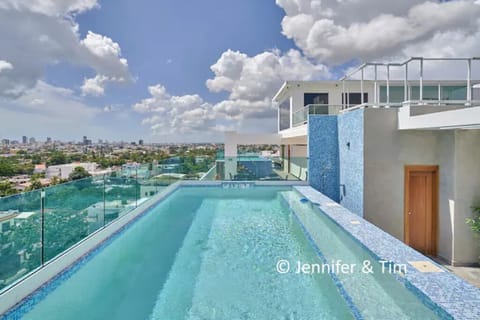 Beautiful Shared Rooftop Terrace comes with an Infinity Pool and stunning views.