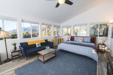 Living Area with King Bed: Beautiful Mountain Views