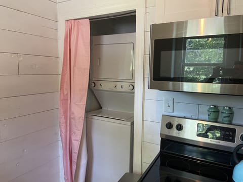 The laundry is easily accessed in the kitchen.