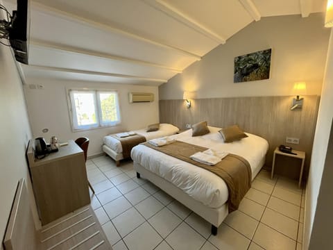 Standard Triple Room | Premium bedding, in-room safe, desk, blackout drapes