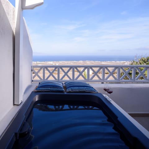 Hot tub with an amazing sea view to the east coast of Santorini