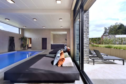 Indoor pool, sun loungers