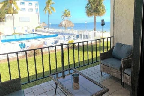 Enjoy stunning beach and pool views from the comfort of the patio.