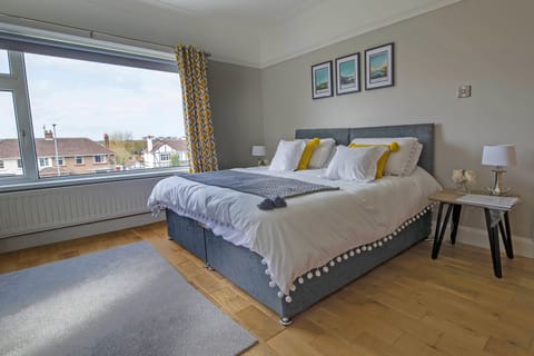 Individually decorated, desk, blackout drapes, iron/ironing board