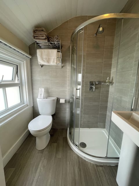 Shower, free toiletries, hair dryer, towels