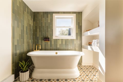 King Studio | Bathroom | Hair dryer, towels, soap, shampoo