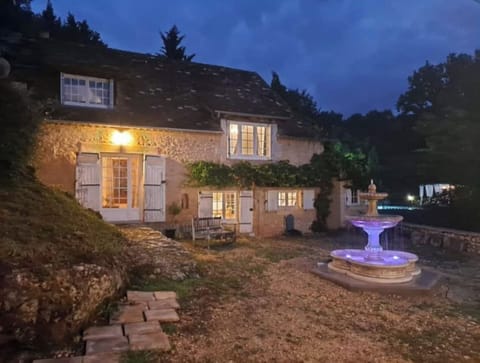La Maison de la Grotte by night from the courtyard