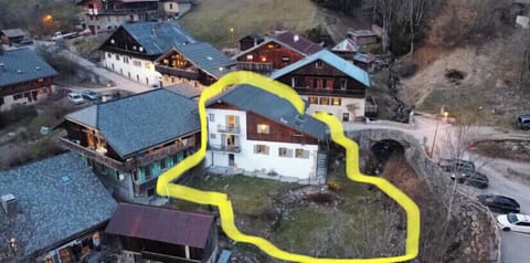 Birds eye view showing house and garden. Garden is fenced so safe for dogs