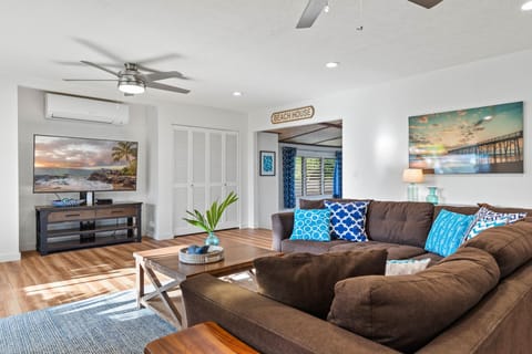View of living room with passage to Game/Dining Room