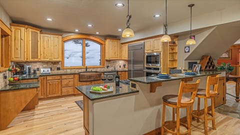 Spacious kitchen with breakfast bar seating