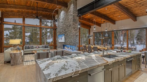 Professional grade kitchen overlooks great room and dining area, with breakfast nook adjacent to kitchen