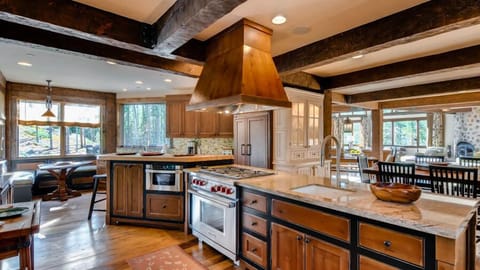 Kitchen with 2 sinks, gas stove, lots of workspace