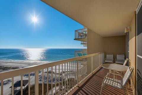 Balcony has 4 chairs, one round table, and  chaise lounge.  Relax or have a meal
