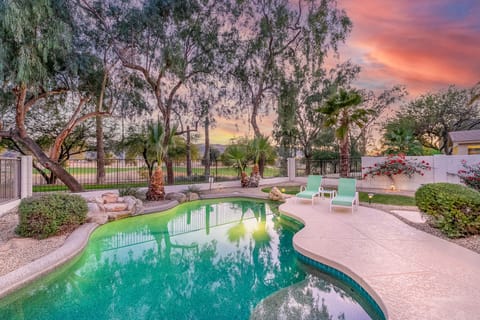 Relaxing pool with stunning views and waterfall feature!
