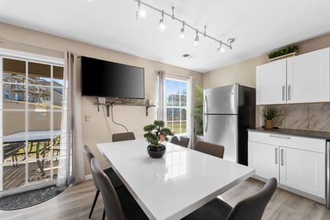 Kitchen table has seating for 6