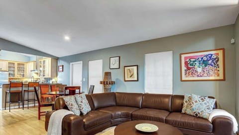 Living room with comfortable seating and TV for streaming
