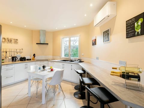 Table, Furniture, Cabinetry, Sink, Countertop, Wood, Window, Chair, Tap, Flooring