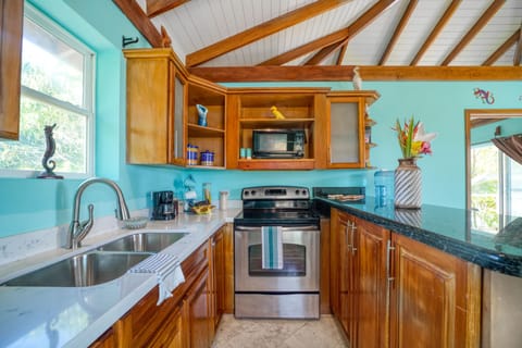 Villa, Private Pool, Beachfront | Private kitchen | Full-size fridge, microwave, oven, stovetop
