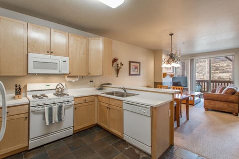 Kitchen open to dining and living to enjoy the great mountain views