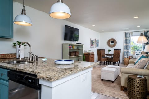 An inviting open concept combines the living, dining and kitchen areas.