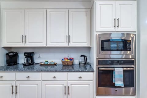 Coffee & Wine Bar: Drip Coffee, Keurig, and Tea area with a microwave and oven.