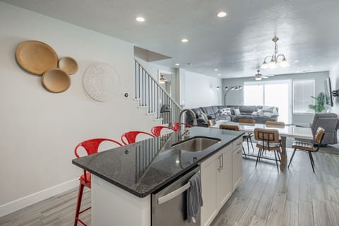 Kitchen - The Kitchen is complete with everything you will need for meal preparations including pots, pans, baking dishes, plates, cups, silverware, cutlery, and an assortment of cooking utensils.