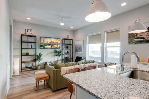 Both kitchens are built for group cooking without the chaos. Open island with seating means no one's stuck at the stove while the party moves on elsewhere