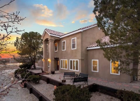 Sandia Sunsets sits majestically on an acre corner block
