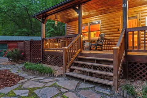 Revel in the charm of rocking chairs and glowing lights under the stars!