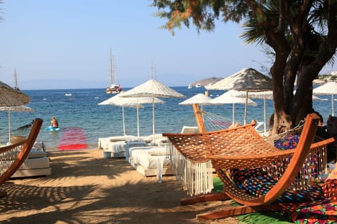 Private beach, sun loungers, beach umbrellas, beach bar